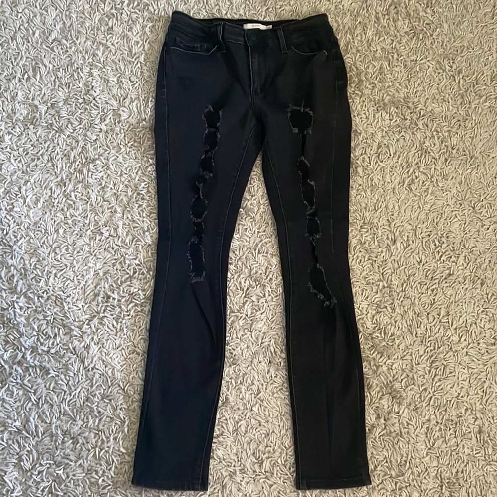 Levi’s Brand.  Black distressed jeans.